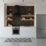 Kitchen with peel and stick wall tile backsplash and modern appliances.