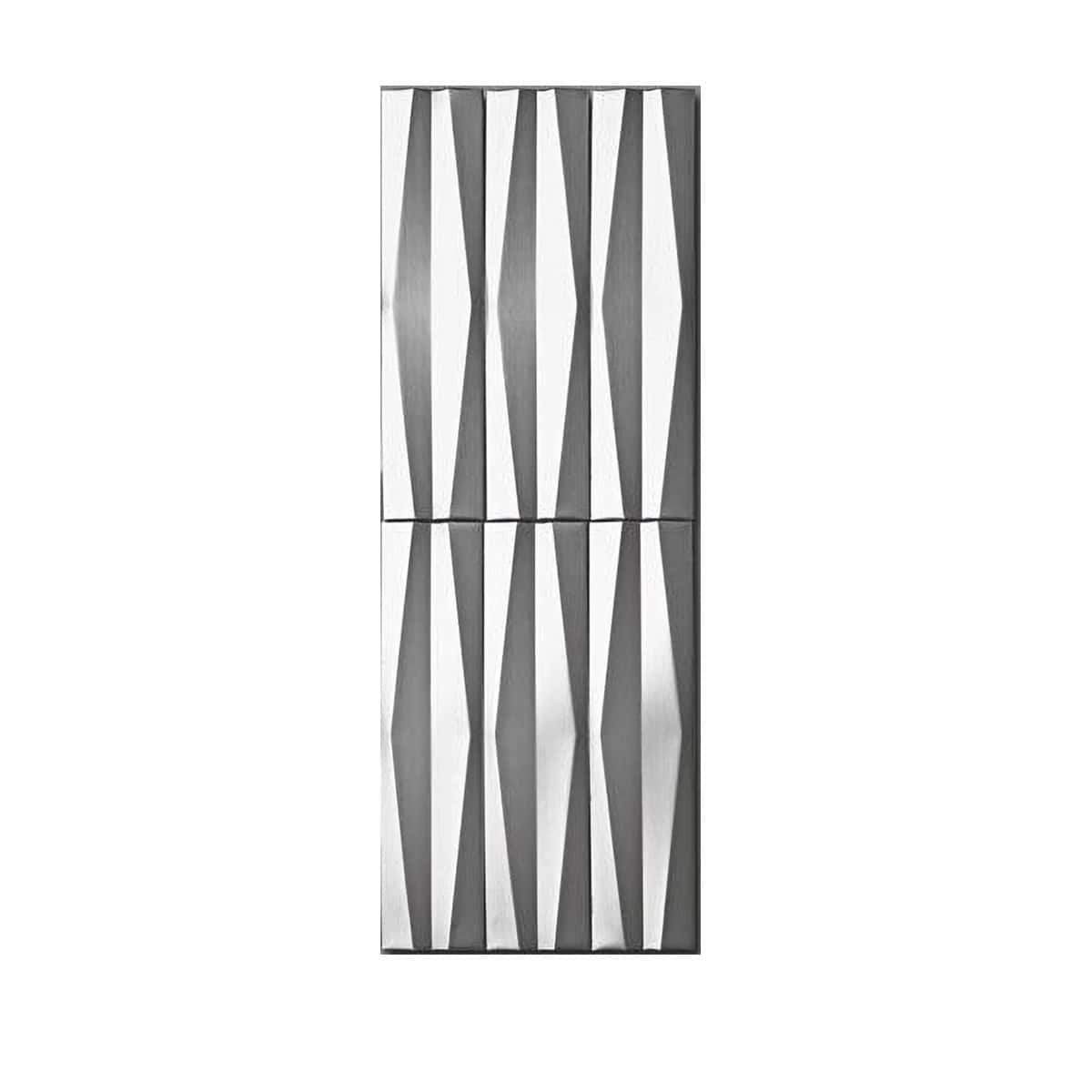 Reflective silver geometric wall mirror.