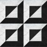 Black and white marble tile with geometric design, smooth texture, and contrasting colors.