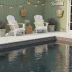 Relaxing pool area with white chairs, potted lavender, and a green wall featuring glass mosaic tiles. Perfect for outdoor lei.