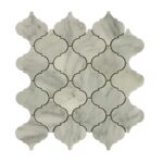 Elegant white marble Moroccan tile with gray veining and black grout lines.