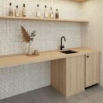 Beige ceramic tiles with a smooth, matte finish and subtle texture, creating a clean and contemporary look.