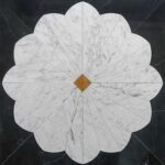 White marble tile with a flower shape, polished surface, and subtle gray veining.