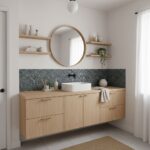Modern bathroom with peel and stick wall tiles, wooden vanity, round mirror, and natural light.
