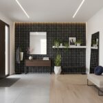 Black and white polka dot tile wall with modern decor.