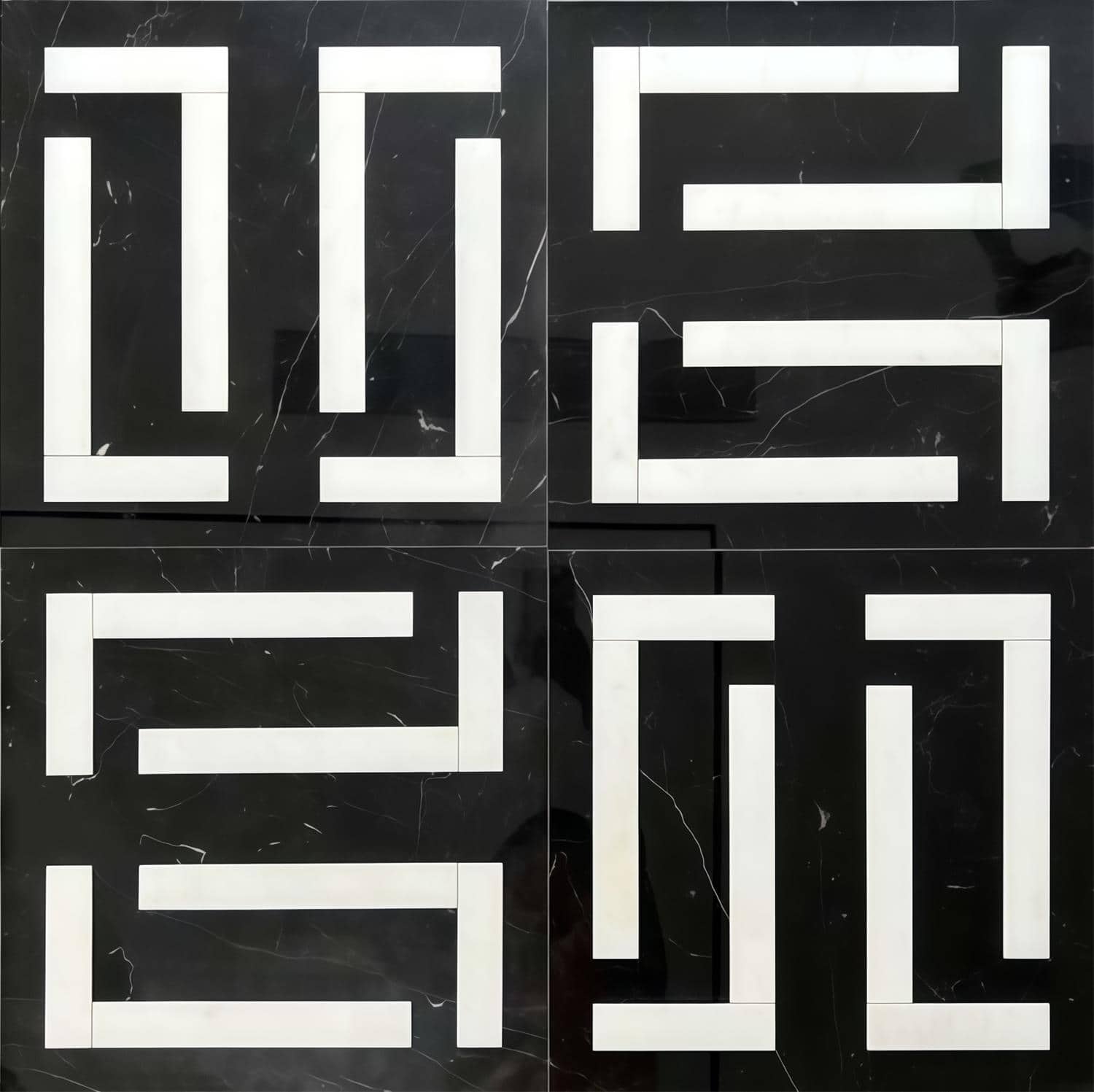 Black marble tile with white geometric pattern, smooth texture, and modern style.