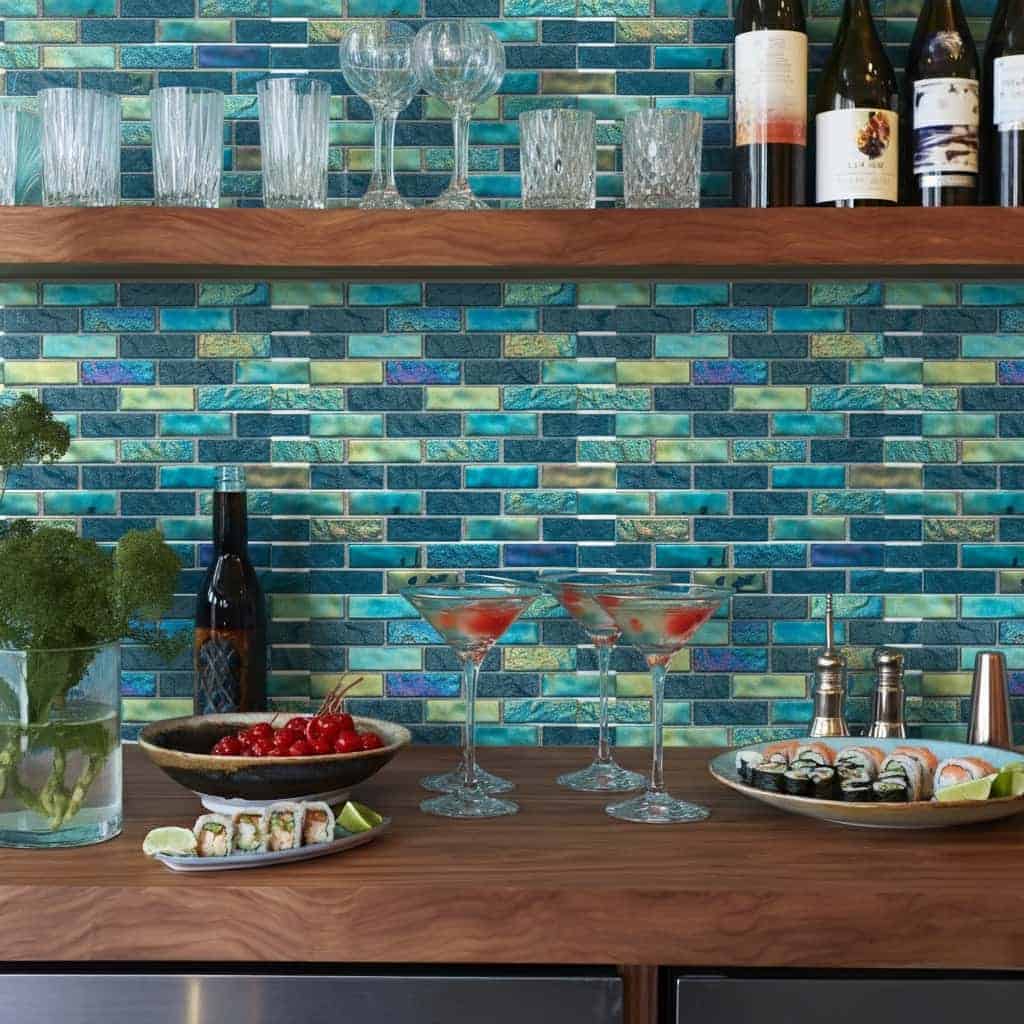 Colorful glass tile backsplash with a mix of blue shades enhancing kitchen aesthetics.
