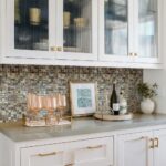 Beautiful seashell tile featuring mother of pearl for kitchen or bathroom decor. Elegant oyster shell tile adds a natural, sh.