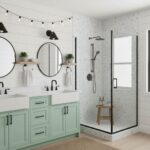 Bathroom shower with glass mosaic tile and mint vanity, modern design with black fixtures and natural light.