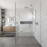 Herringbone patterned white and gray tiles with smooth texture, modern and clean aesthetic.