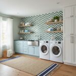 Laundry room with peel and stick wall tile behind washer and dryer.