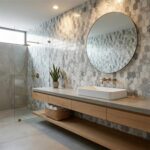 Hexagon patterned tile with a mix of gray and white shades, textured surface, in a contemporary bathroom.