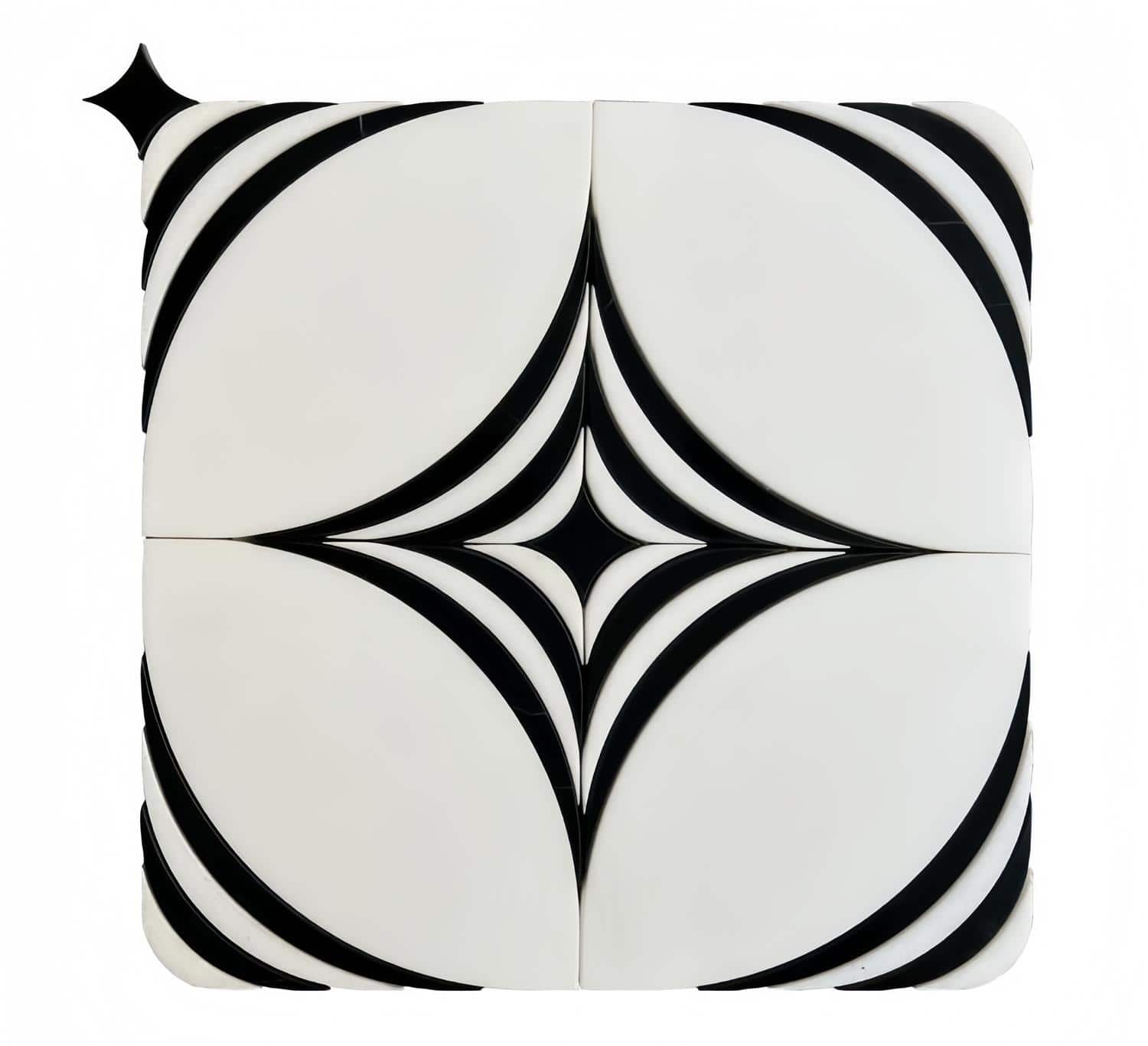 Black and white geometric ceramic tile with a glossy finish, featuring a starburst pattern.