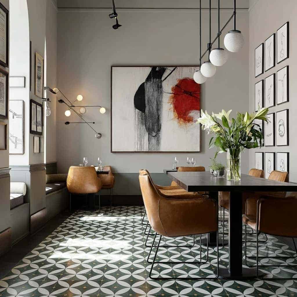 Describe tile color, texture, and pattern: Black and white geometric patterned ceramic tile with a matte finish, adding a con.
