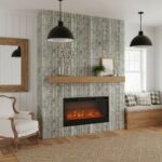 Gray textured tile fireplace with a sleek electric insert, wooden mantel, and cozy living room decor.
