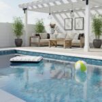 Poolside glass mosaic tile backsplash enhances outdoor pool area with stylish, durable design. Perfect for modern poolside ae.