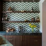 Bright green and white zigzag peel and stick tile backsplash in a modern kitchen.