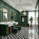 Elegant green bathroom with marble countertops and gold accents, featuring crystal chandeliers and a patterned black-and-whit.