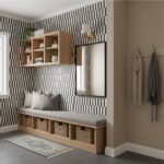 Black and white geometric patterned tile wall with wooden storage bench and wall-mounted shelves.