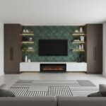 Peel and stick tile backsplash on green accent wall with built-in shelves in contemporary living room.