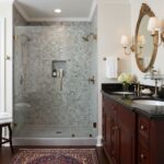 Light gray hexagon tiles with textured surface in shower area.