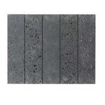 Dark gray concrete tiles with rough, textured surface and small black aggregate specks.