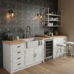 Gray stone textured tile wall behind the kitchen sink and countertop.
