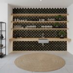 Black scalloped ceramic tile with glossy finish and textured surface, arranged in a fish scale pattern.