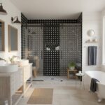 Black and white mosaic tile with textured surface in bathroom shower area.