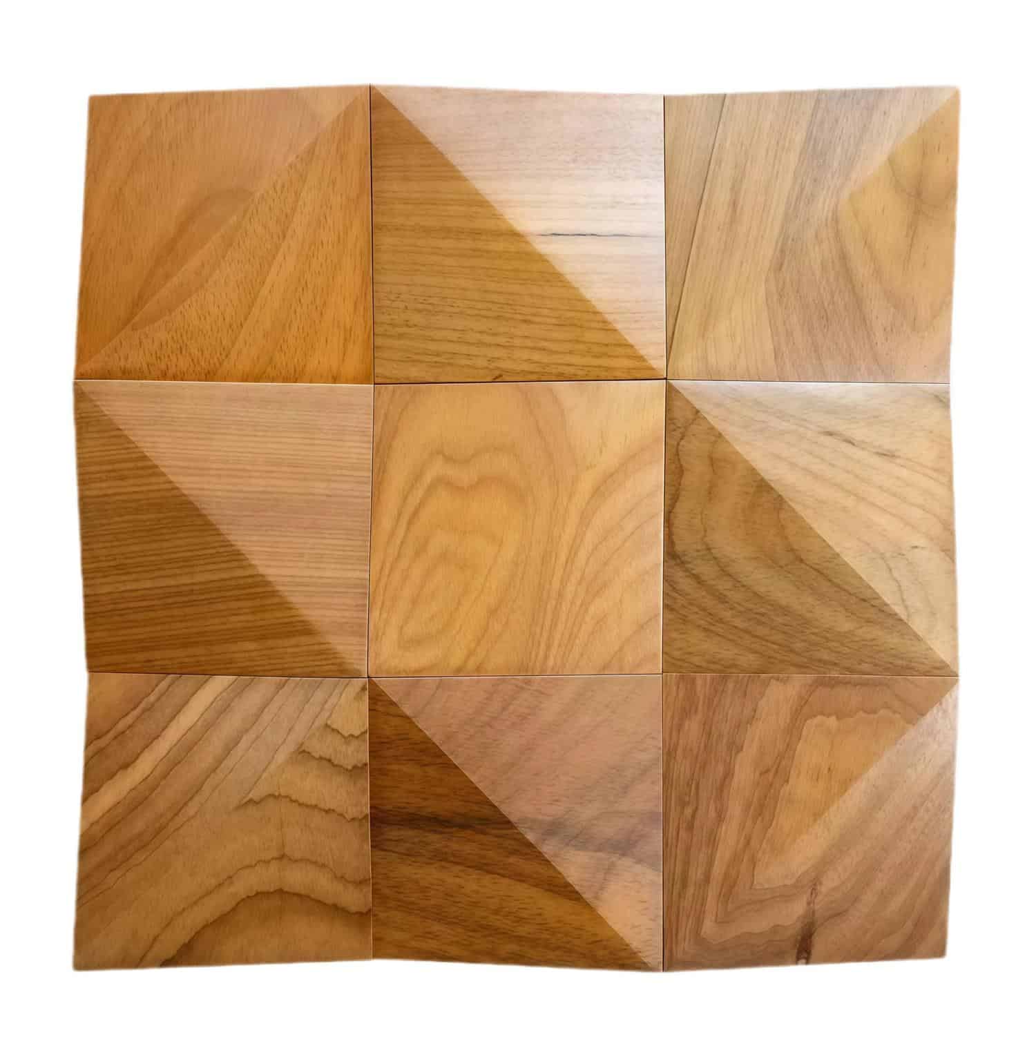 Wooden tile with natural light brown color and smooth texture, featuring geometric design with diagonal and square patterns.