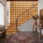 Decorative wooden tile wall with geometric pattern in warm tones.