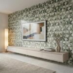 Decorative wall tile with geometric art deco pattern in shades of green and beige.