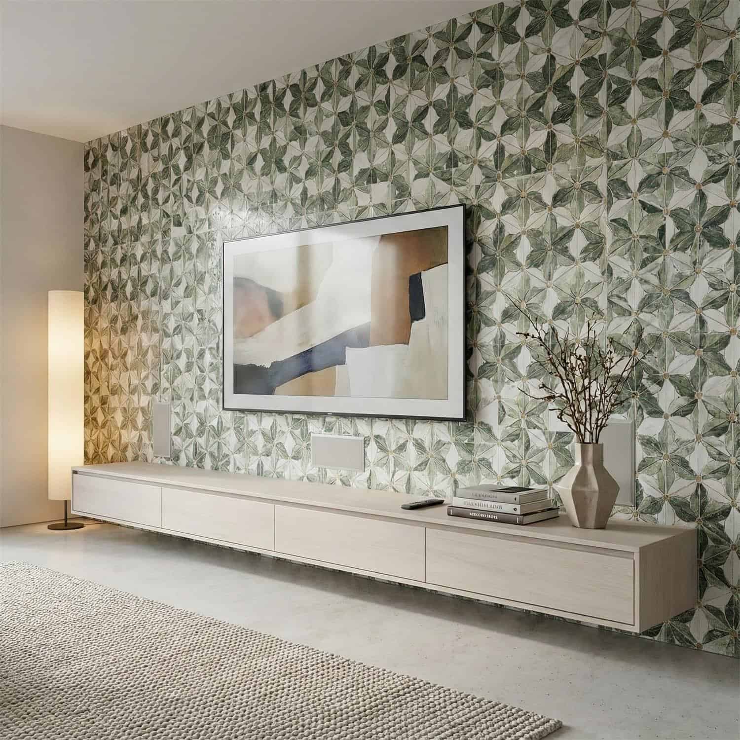 Decorative wall tile with geometric art deco pattern in shades of green and beige.
