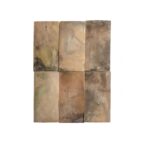 Natural stone tiles in earthy tones with a rustic, weathered texture, perfect for vintage or outdoor design projects.