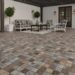 Warm-toned brick paver tiles with textured surface for outdoor patio flooring.