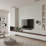 Black and white patterned ceramic tile wall with textured surface in living room.