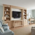 Mother of pearl shell tile used as a decorative wall accent in a modern living room. Elegant, reflective, and natural seashel.
