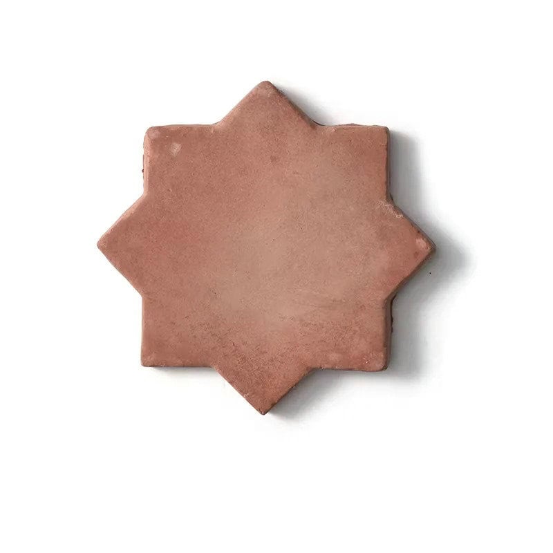 Terracotta star-shaped tile with a matte finish and warm earthy tone.