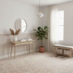 Bright, neutral-toned textured tile with a subtle pattern, complementing the light and airy decor.