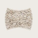 Light beige stone mosaic tile with textured surface.