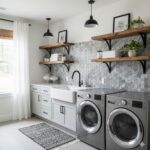 Modern laundry room with peel and stick tile backsplash, washer, dryer, and open wooden shelves.