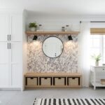 Round Mirror with Leaf Pattern Wall Tile.