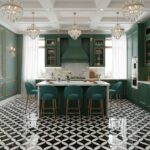 Elegant green cabinetry with gold accents and a marble backsplash. Black and white geometric patterned floor tiles add a mode.