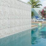 Beautiful glass tile pool wall with mosaic design, perfect for modern outdoor swimming pools.