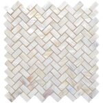 Mother of pearl shell tile with a herringbone pattern, featuring iridescent oyster shells for luxurious interior accents.