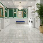 Bright laundry room with green and white patterned tiles, white cabinetry, and gold accents. Features a chandelier, mirror, a.