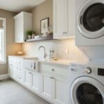 Mother of pearl shell tile backsplash in a bright, modern laundry room.