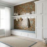 Bright room with peel and stick tile accent wall, white storage cabinet, and window with sheer curtains.