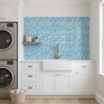 Kitchen backsplash with shimmering mother of pearl shell tile in shades of blue.