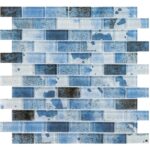 Up of blue glass tile mosaic with varied shades and textures, ideal for backsplashes and pool surfaces.